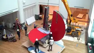 Installation of Fletcher Benton's Folded Circle Dynamics Red Phase III