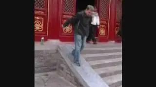 Allen slides through the dust in Beijing