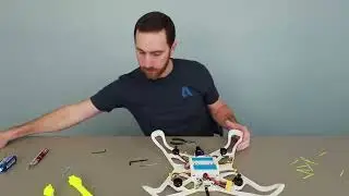 Manufacturing Process with Autodesk Fusion 360 - Video:3.14 Securing wires and installing propellers