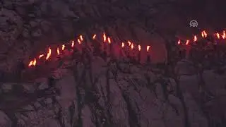 Irak'ta Nevruz'u kutlayanlar ellerinde meşalelerle Akre Dağı'na çıktı   DUHOK