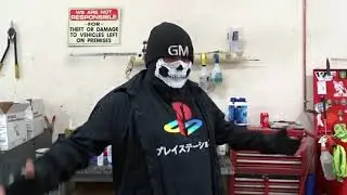 Ghetto-Man Reads Educational Material