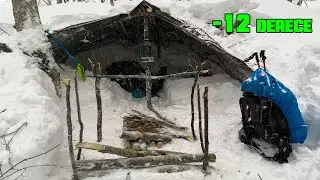 We built a snow shelter at -12 degrees. We baked pita in the oven. We fed the birds.Snow  is 135 cm.