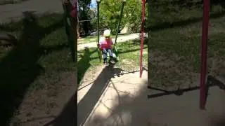 На качельке))))