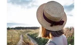 Crochet raffia boater hat.