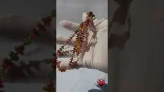 SLOW-MOTION Handcrafted Tourmaline necklace in daylight