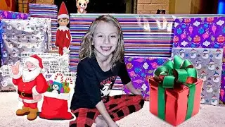 Christmas Morning Opening Presents From Santa