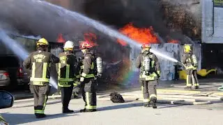 Surrey, BC firefighters battle 2-alarm fire in Newton