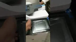 mesin fotocopy baru yang masih bersegel