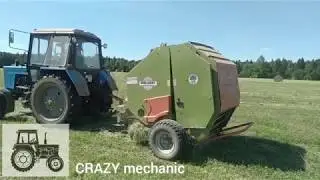 Заготовка сена, МТЗ-82 собирает рулоны пресс-подборщиком R12/MTZ-82 collects rolls with a baler R12