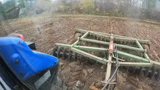 Disking newly plowed sod