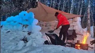 Winter Camping Under a Tarp with Walls Made of Snow - Heavy Snow Overnight.
