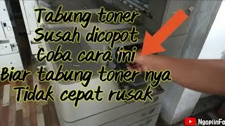 Tabung toner cartridgenya susah dicopot untuk refill tintanya, Coba gosok ininya