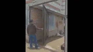 Ворота без привычных осевых петель