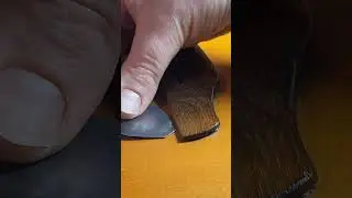 Removing a lifting bridge from a Takamine guitar. #luthier #guitarrepair #luthiery #guitar
