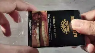cara buka rokok kretek Dji Sam Soe 234 Super Premium