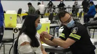 COVID-19 vaccine to be required for most travellers within Canada by end of month
