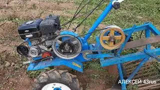 Motoblock Neva with a homemade digger digs itself.22
