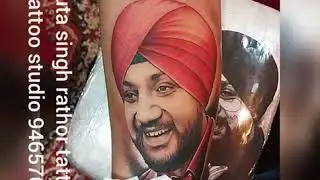coloured portrait tattoo