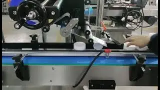 Máy dán nhãn chai tròn và dán nhãn phẳng nắp hộp