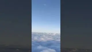 Above the clouds.