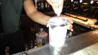 Bartender Ken making an Aperol slushie with liquid