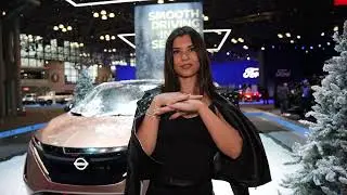 beautiful girl Julia car model at the Auto International car show of New York 2023