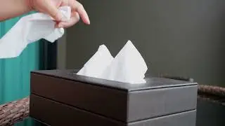 Man hand picking up tissues | 4K Footage