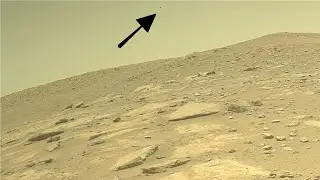 Perseverance Rover Sees A Strange Black Spherical Object Flying Across The Sky With Rainbow Arc