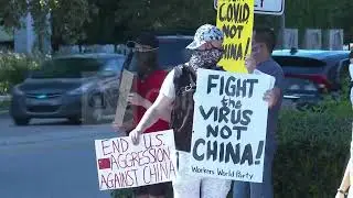 Moving supplies and protesters outside of Houston Chinese consulate