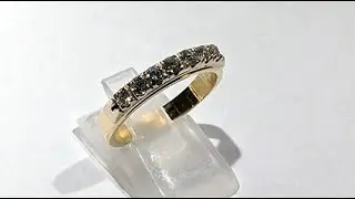 Seven stone diamonds on the 18KT gold band