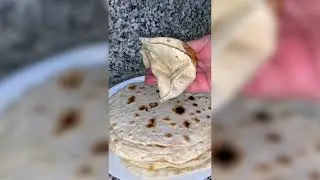 Homemade thin lavash on a frying pan