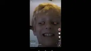 Watching tiktok videos.