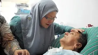 “Nice Girl, That One”: Love Goes On for caregiver Hajjah Rehana, 68, and her Paralysed Husband