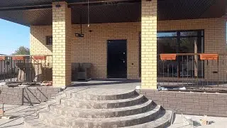 From an ordinary house to a beautiful cottage. Facing a house with facing bricks in detail.