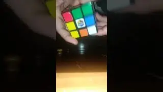 Solving a Rubik's cube but it's low quality and the camera angle sucks