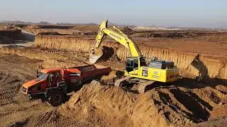 Komatsu PC490LC-11 Heavy Duty loads ADT
