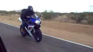 Nathaniel trying stand up wheelie in bad cross-wind