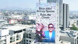 Drone video editing for outdoor sign of Elton John and Britney Spears in LA
