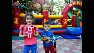 Funny Kids at the outdoor playground play area for kids