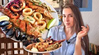 Delicious SEAFOOD in a Greek tavern, octopus, shrimp, squid, mussels