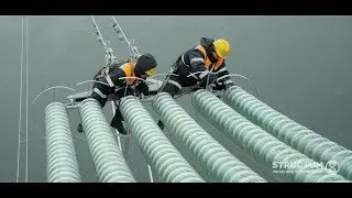 Installation of a wire of 330 kV overhead line across the Dnieper