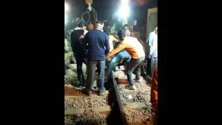 removal of rail-track block with the help of crane