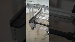 Elevating Efficiency: The Flat Top Chain Conveyor Curve in Pallet Conveyor Systems 