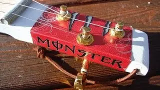 The Red Monster Cigar Box Guitar