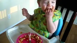 Brandon practicing his fork and open cup