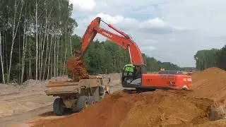 Экскаватор Hitachi Zaxis 330LC-5G грузит думпера Volvo A30D часть 3
