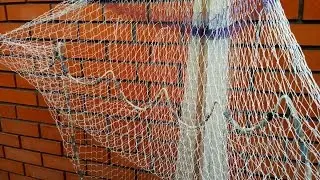Tying the pockets of the casting net.