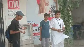Our students flying their  first DIY Drone in front  of Academy