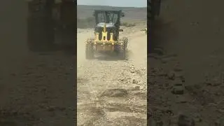 Road Construction work. Material spreading.