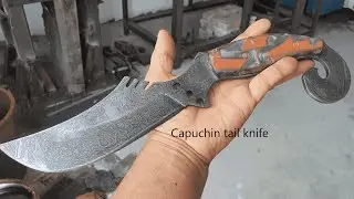 Capuchin tail Damascus knife